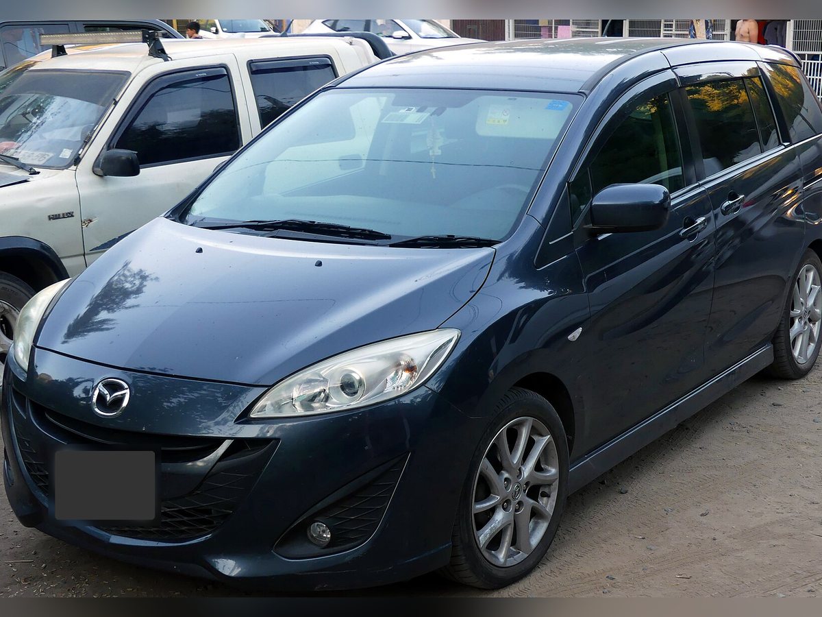 Example photo: blue Mazda Premacy, front three-quarter view. Not the actual car.