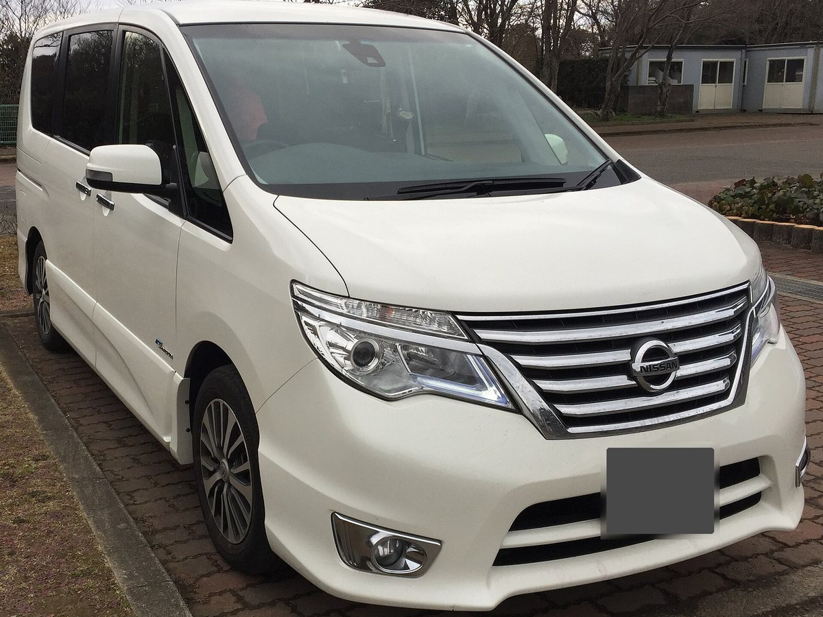 Example photo: white Nissan Serena, front three-quarter view. Not the actual car.